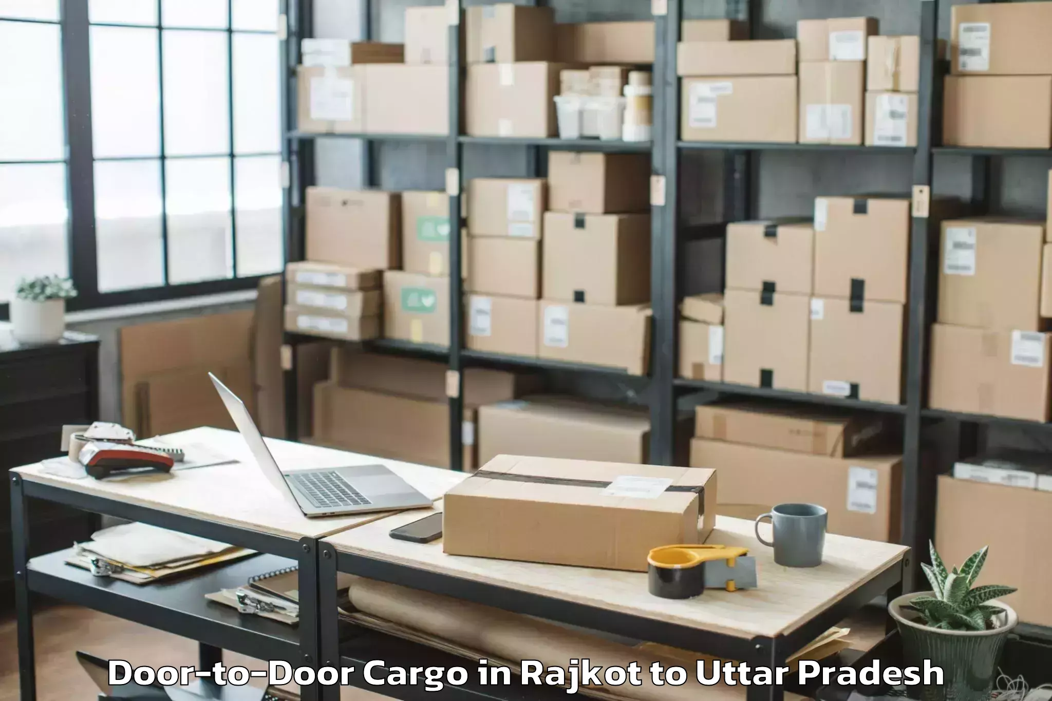 Professional Rajkot to Khadda Door To Door Cargo